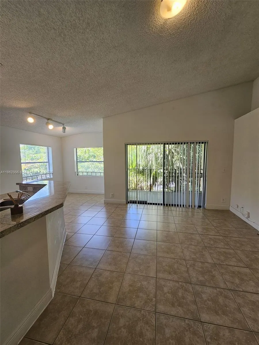 9999 Summerbreeze Dr, #215