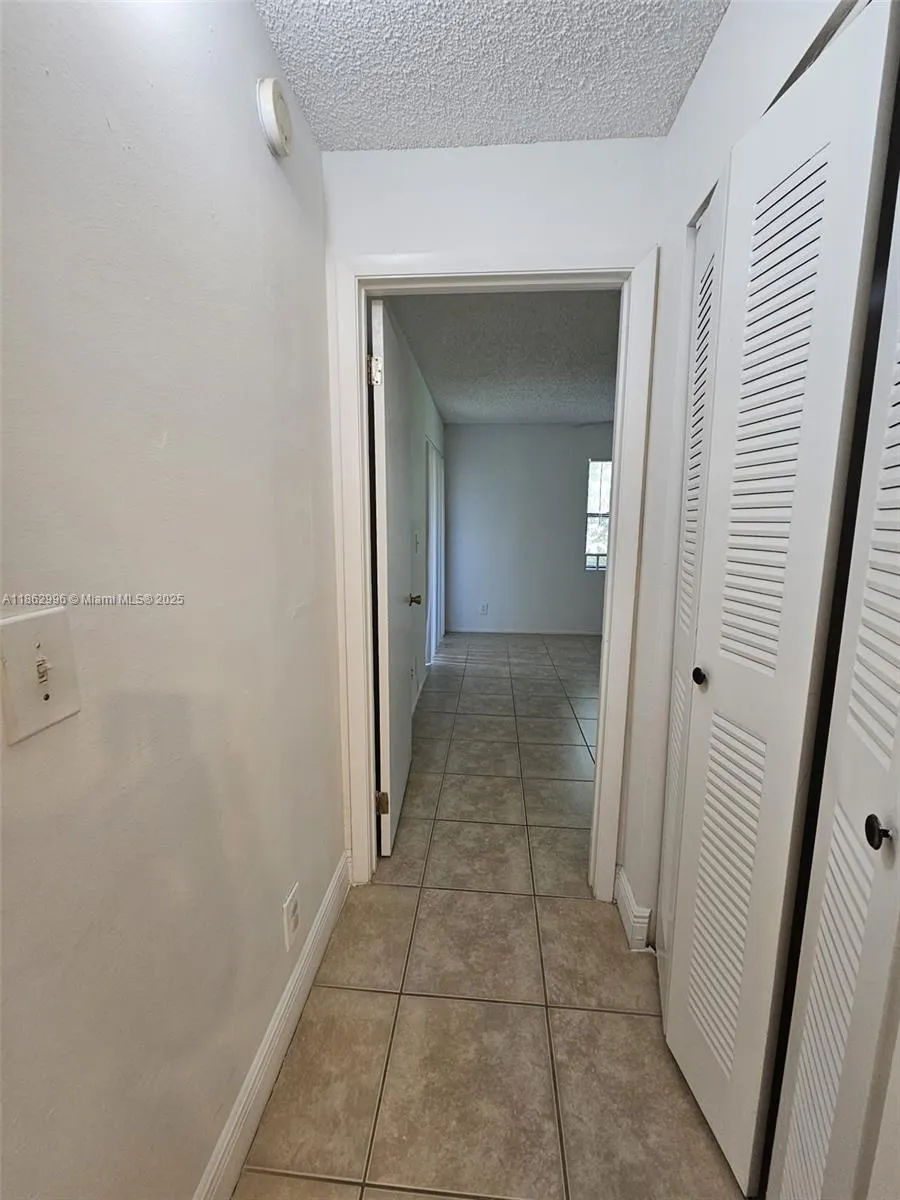 9999 Summerbreeze Dr, #215