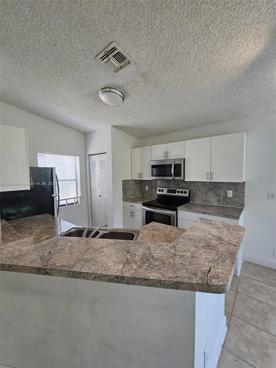 9999 Summerbreeze Dr, #215