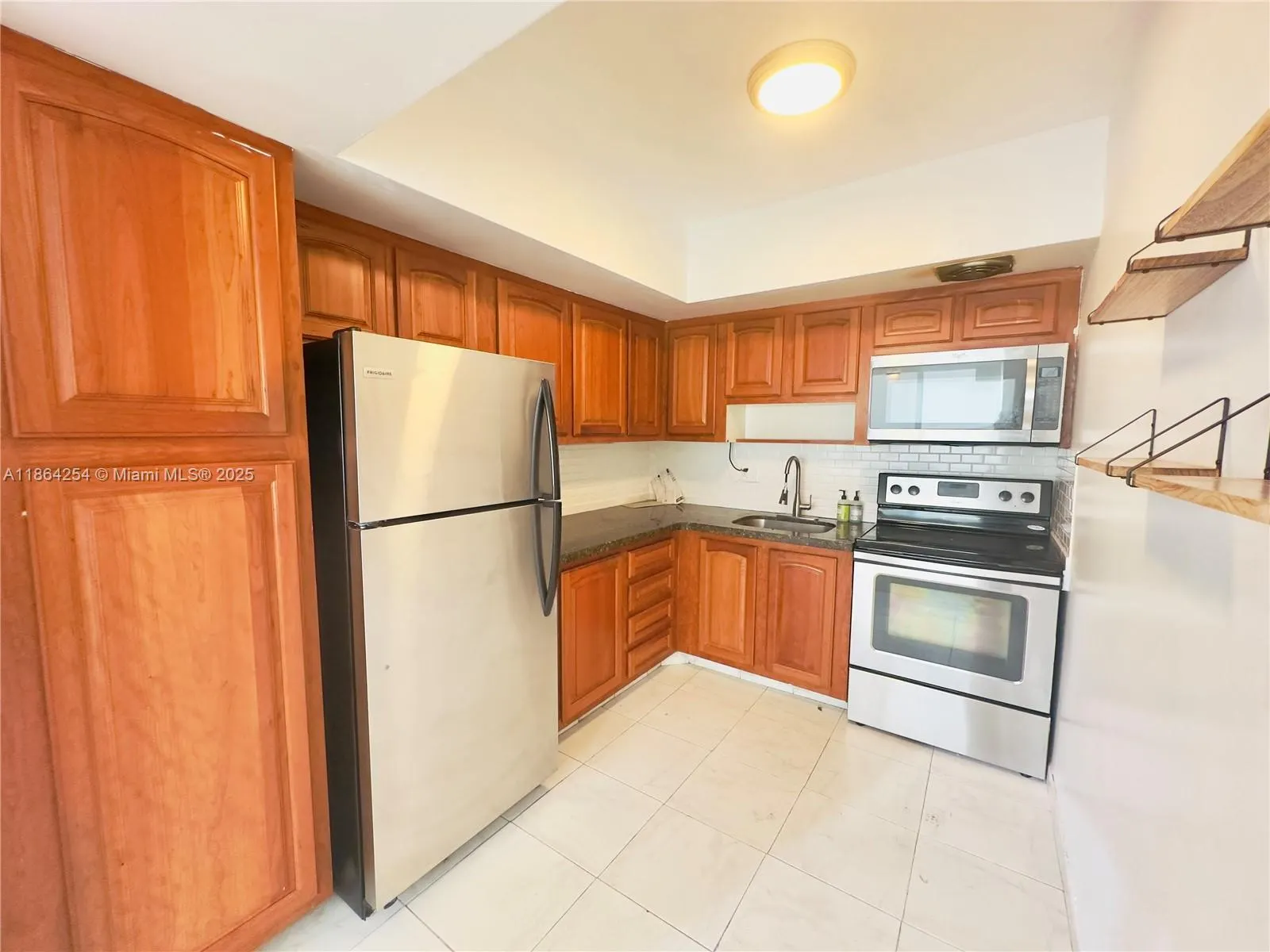455 Golden Isles Dr, #210