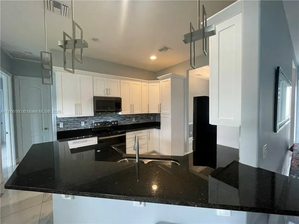 6215 W Deville Cir