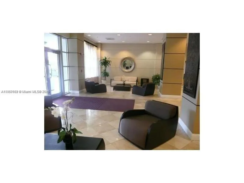 19390 Collins Ave, #203