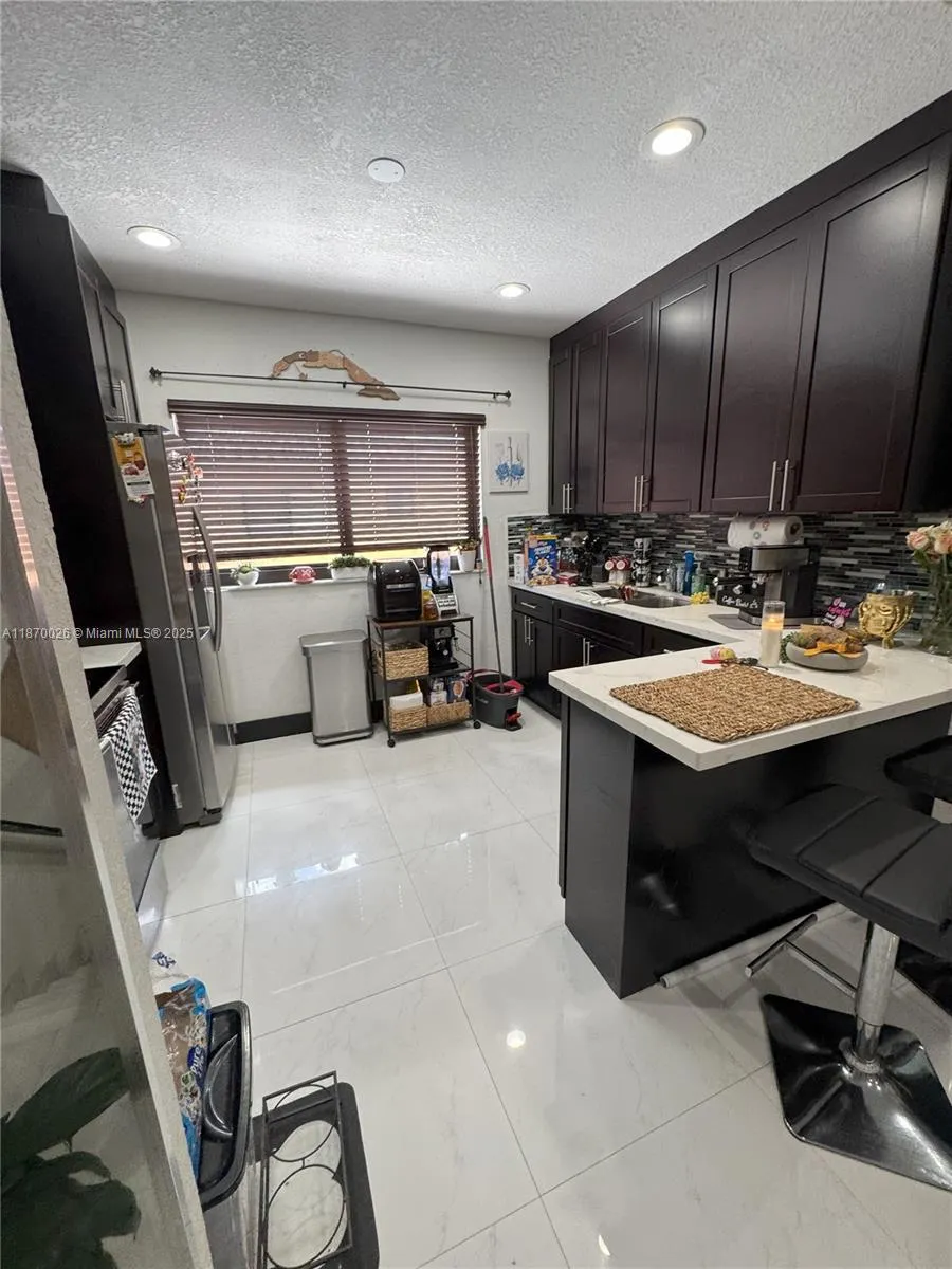 6411 W 27th Way, #201