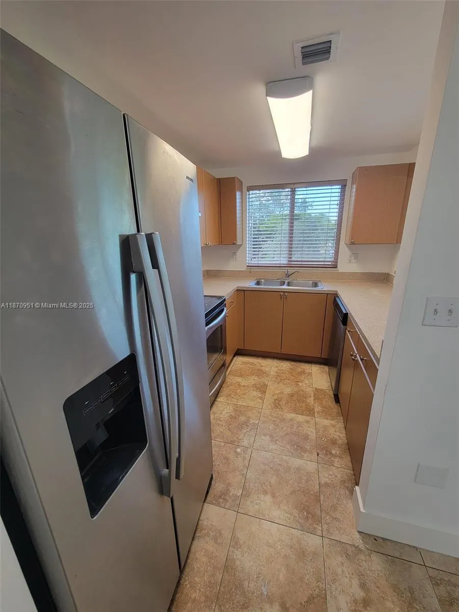 357 N Royal Poinciana Blvd, #205