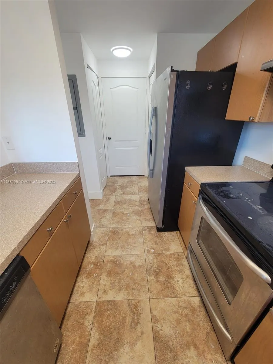 357 N Royal Poinciana Blvd, #205