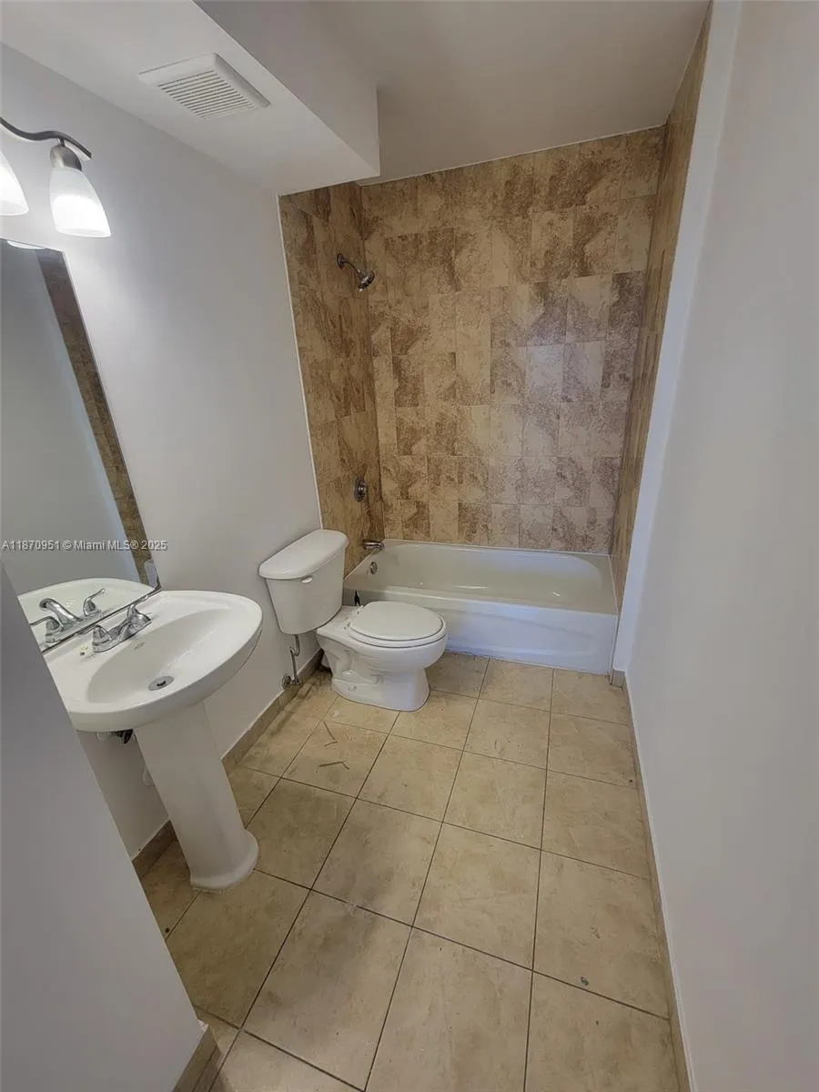 357 N Royal Poinciana Blvd, #205