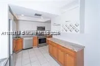 100 Golden Isles Dr, #809