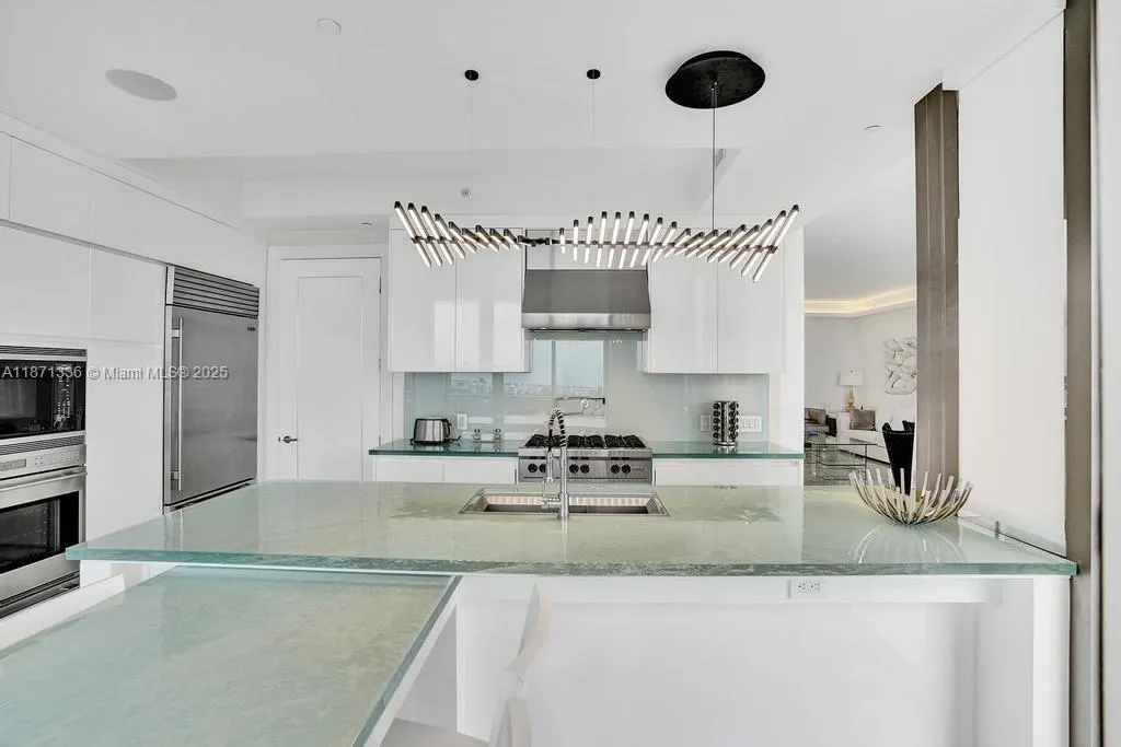 9705 Collins Ave, #702N