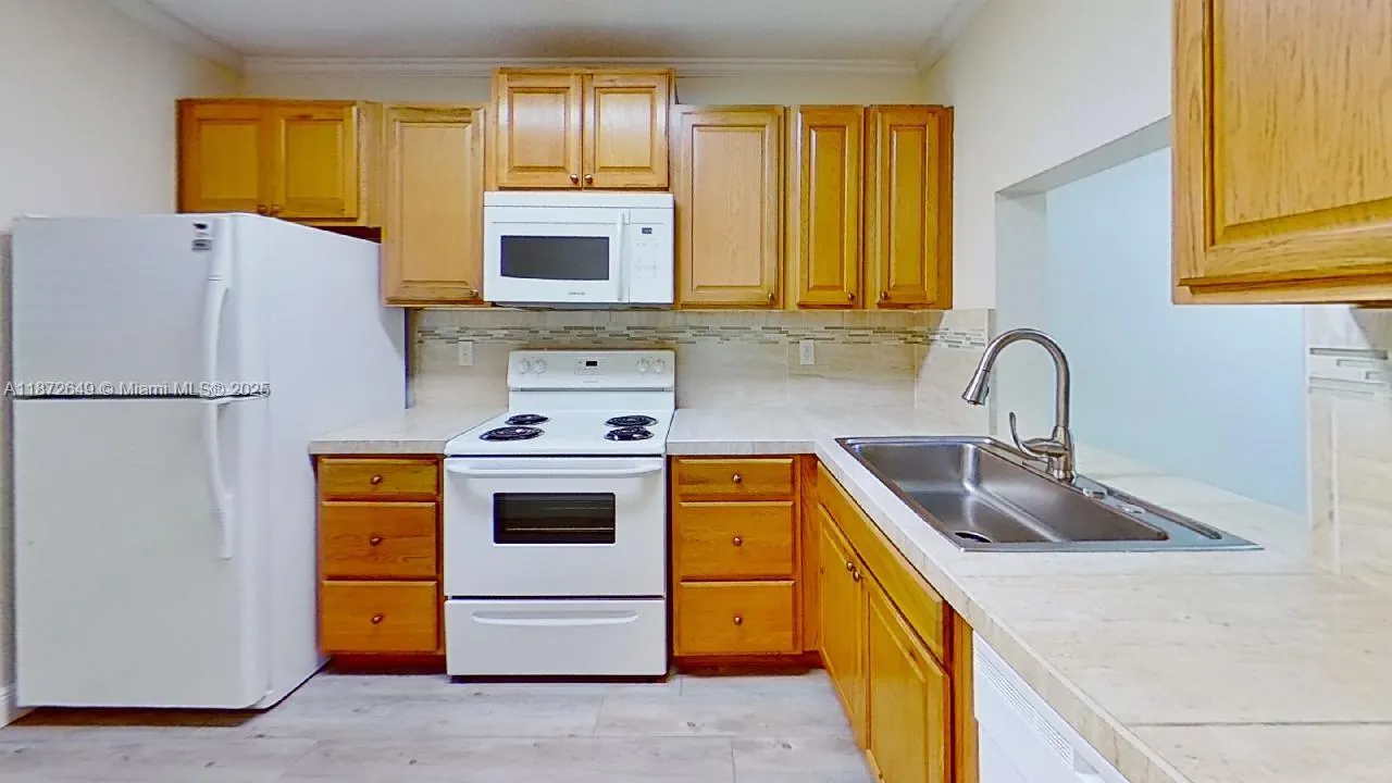 7406 Woodmont Ter, #205