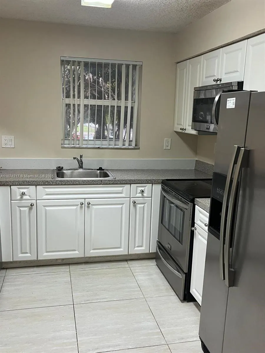741 N Pine Island Rd, #212