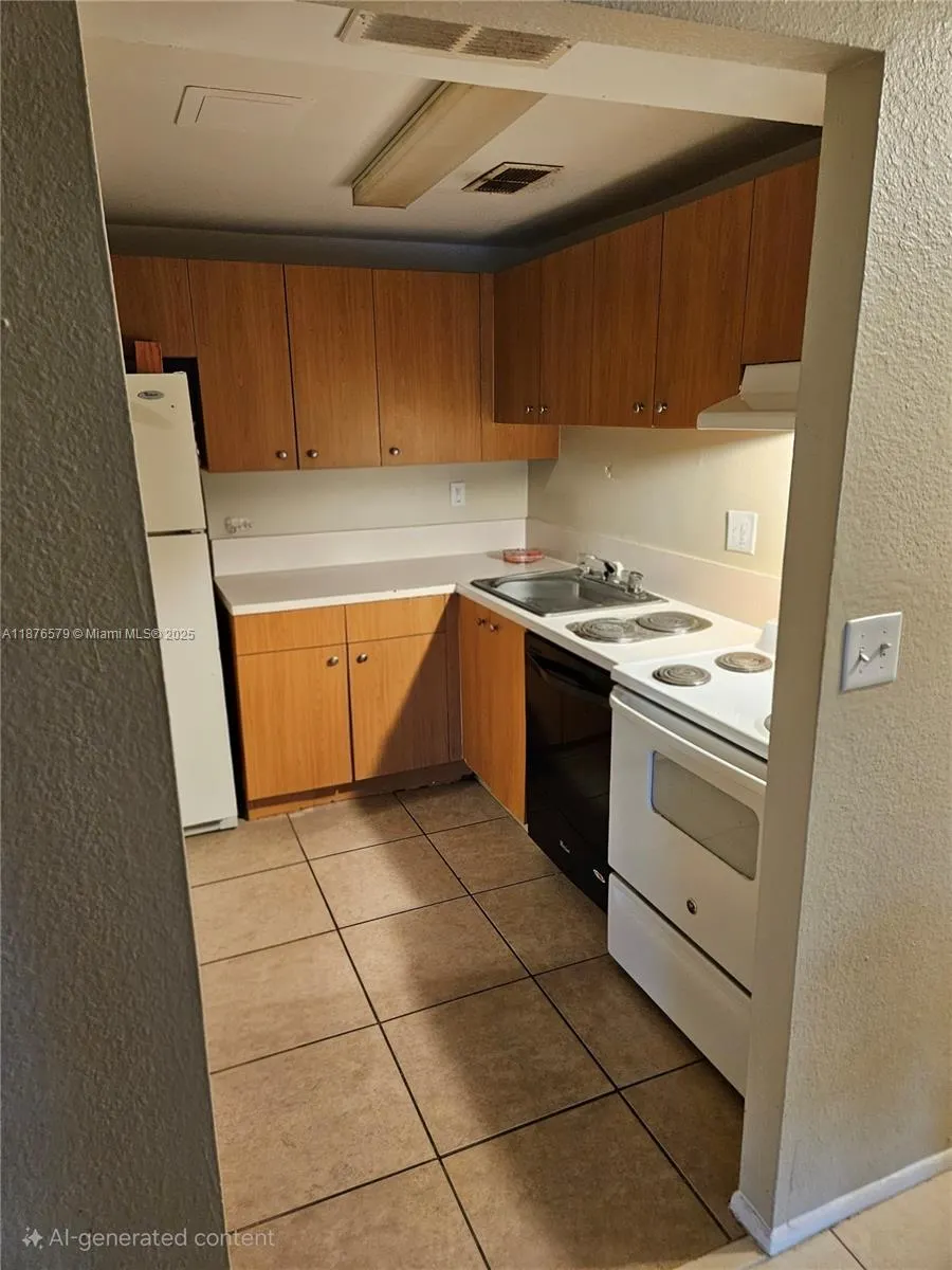 411 Executive Center Dr, #209
