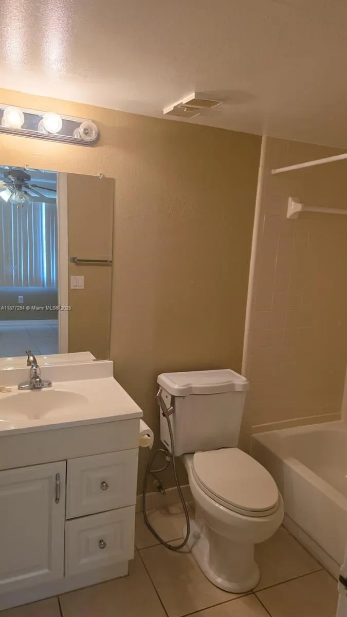 5040 terrace Palms circle, #202