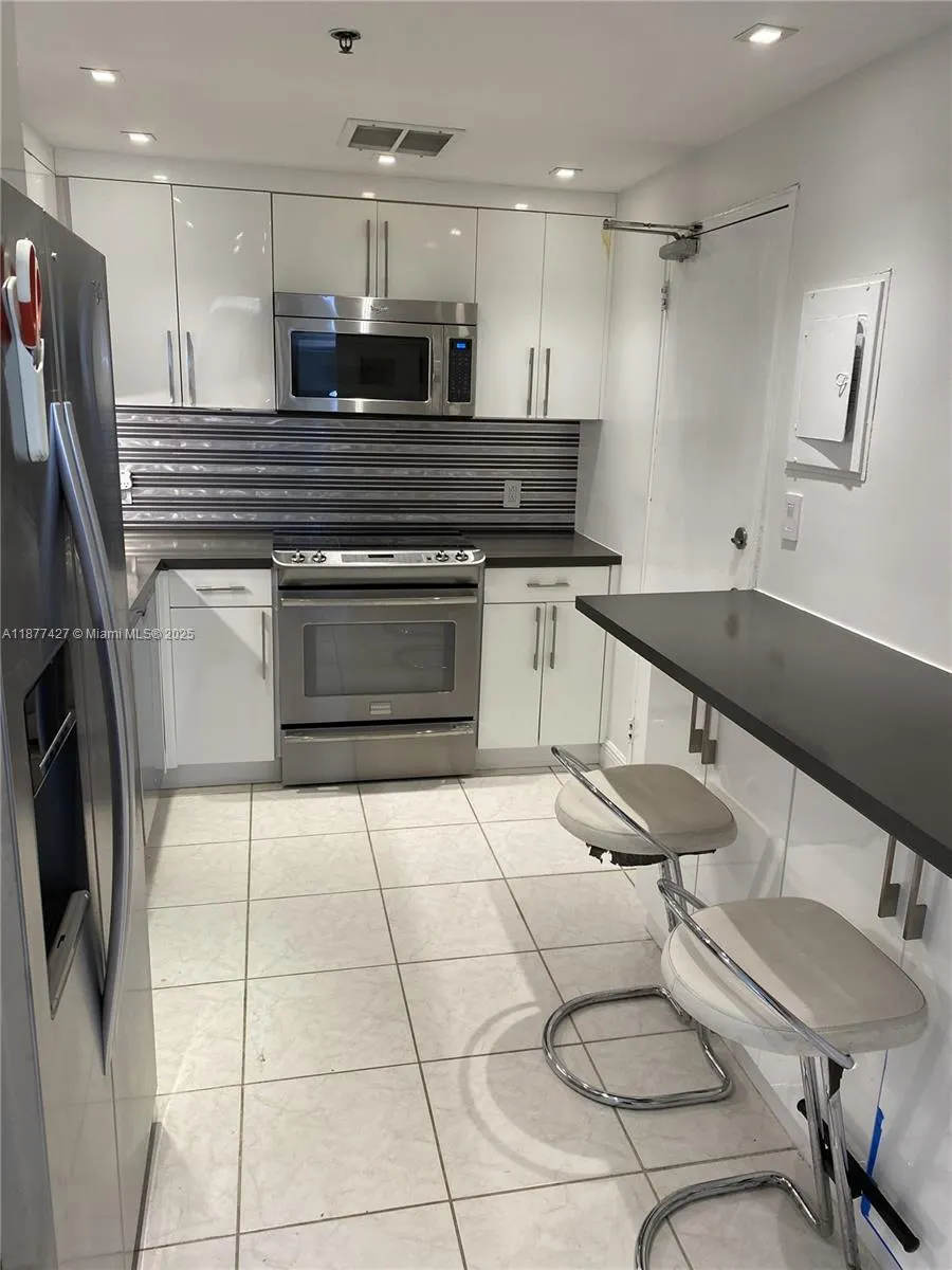 10185 Collins Ave, #319