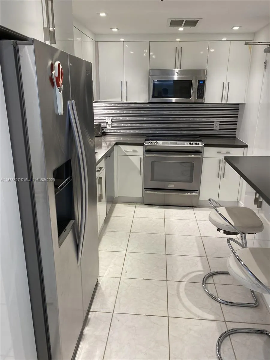 10185 Collins Ave, #319