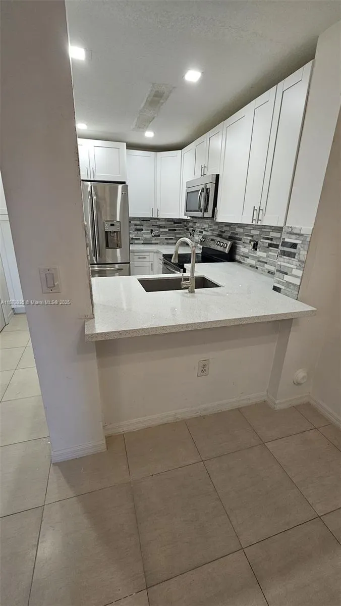 6202 NW 115th Pl, #327