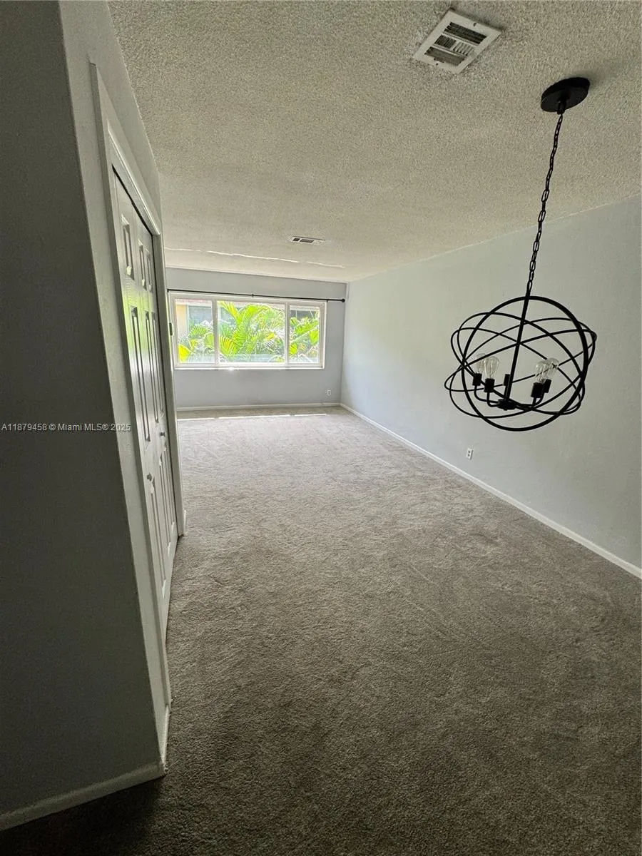 2701 NE 1st St, #203