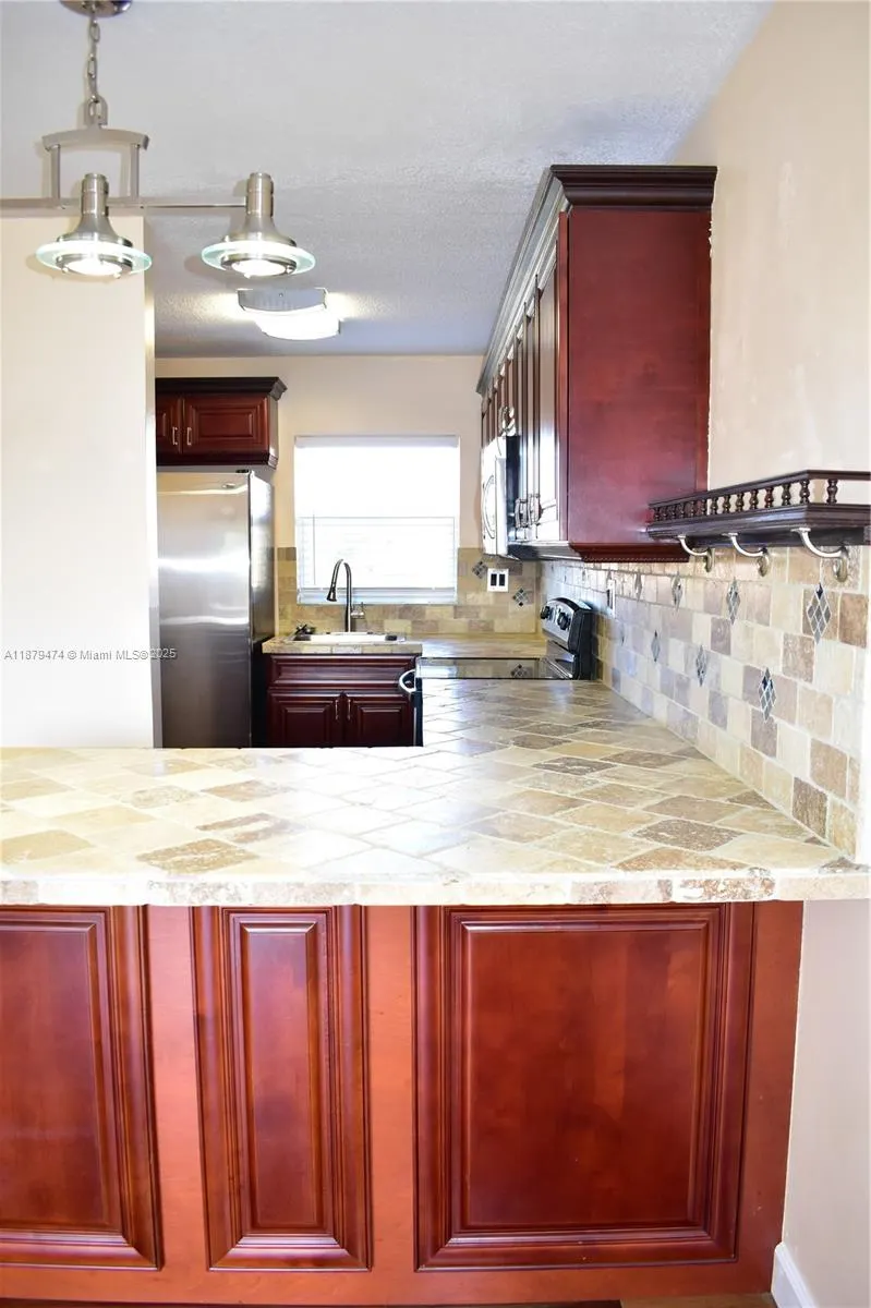9641 Sunrise Lakes Blvd, #306