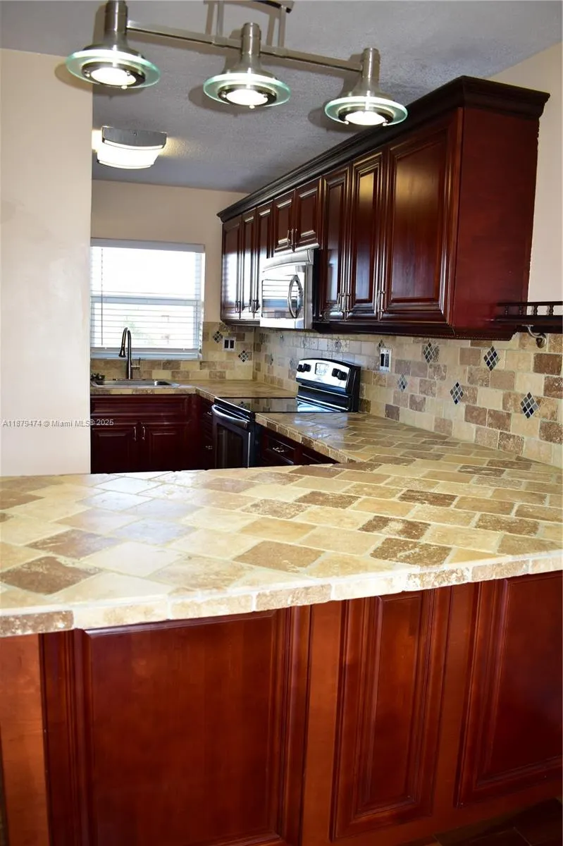9641 Sunrise Lakes Blvd, #306