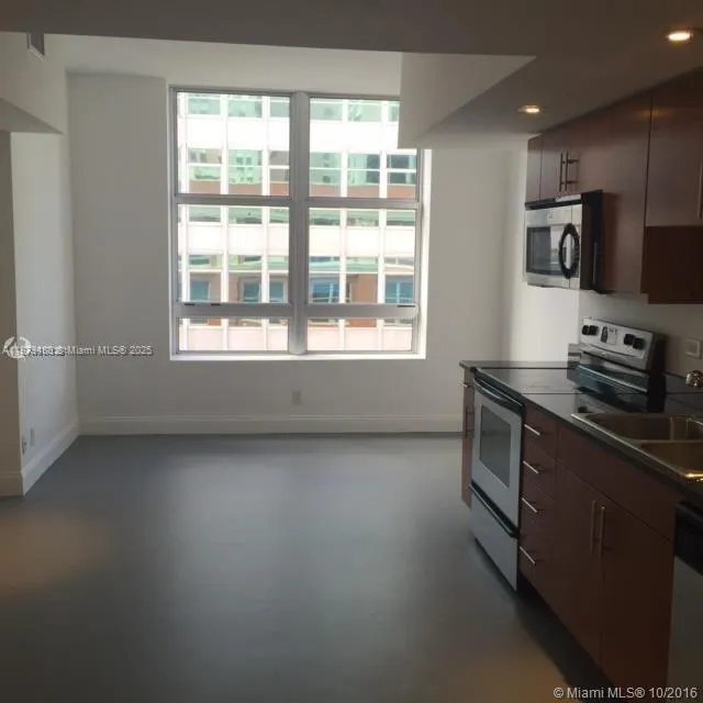 111 E Flagler St, #1003