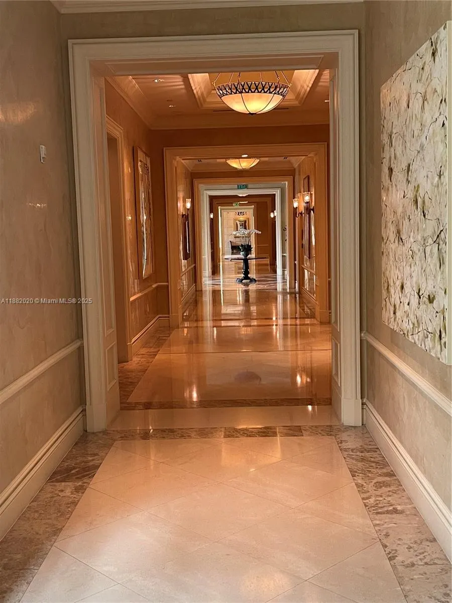16047 Collins Ave, #404