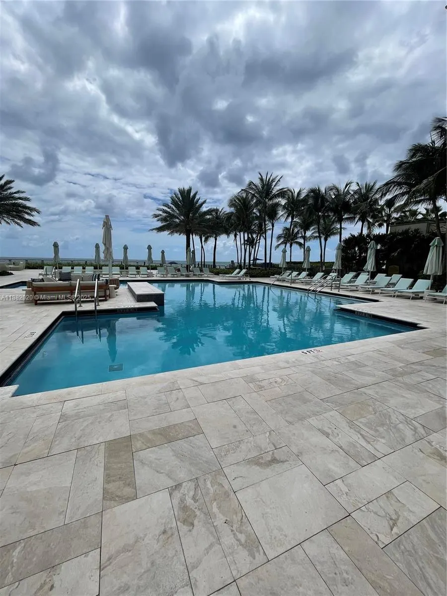 16047 Collins Ave, #404