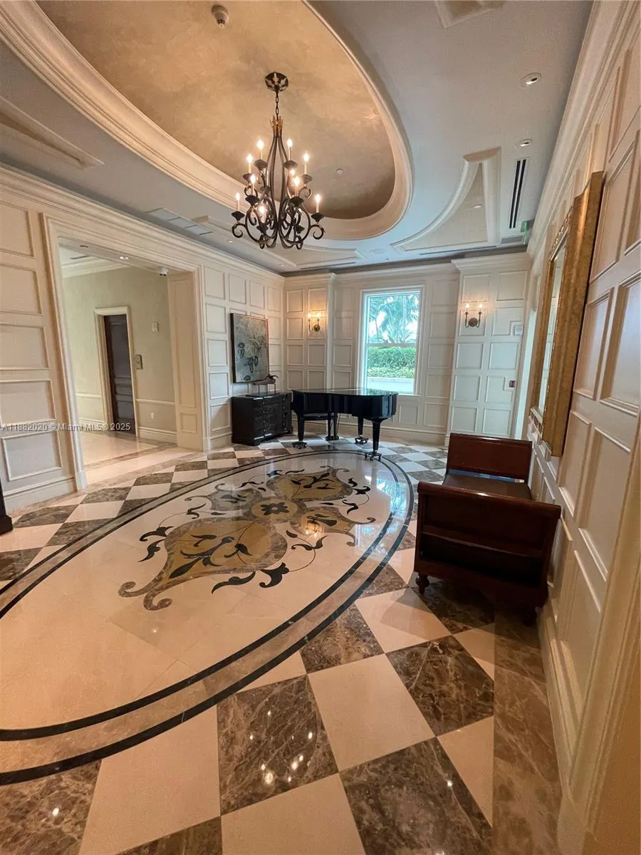 16047 Collins Ave, #404