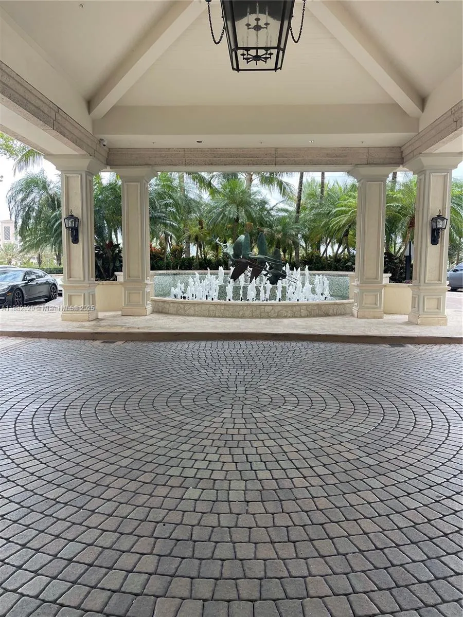16047 Collins Ave, #404