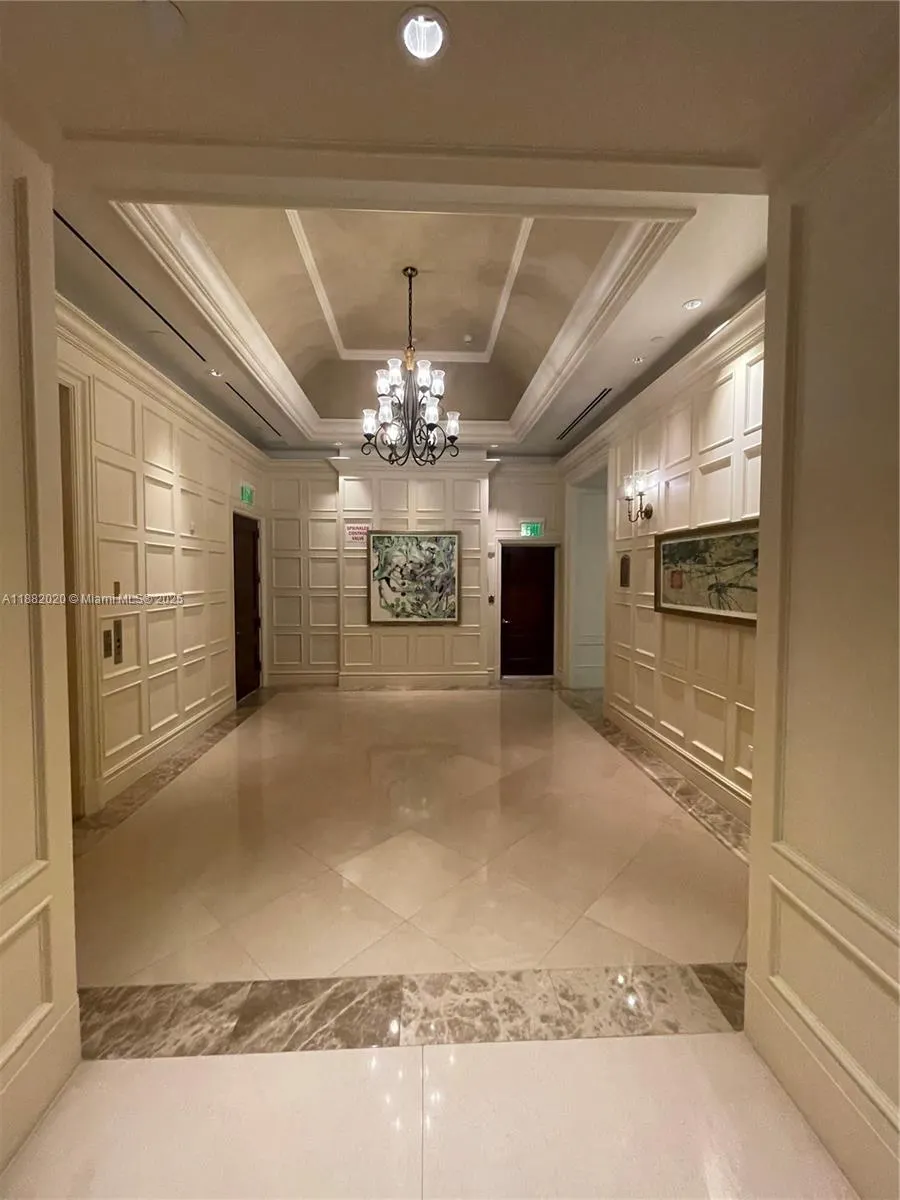 16047 Collins Ave, #404