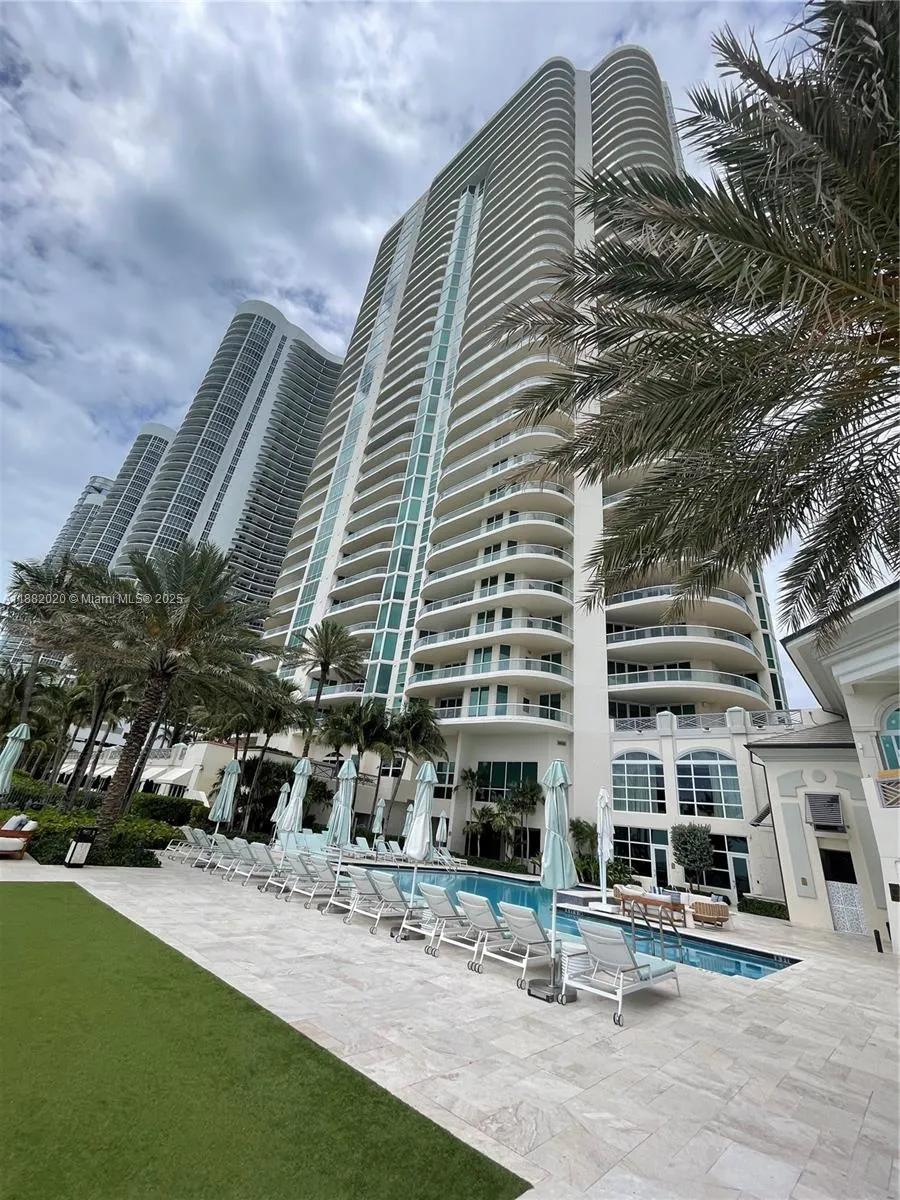 16047 Collins Ave, #404