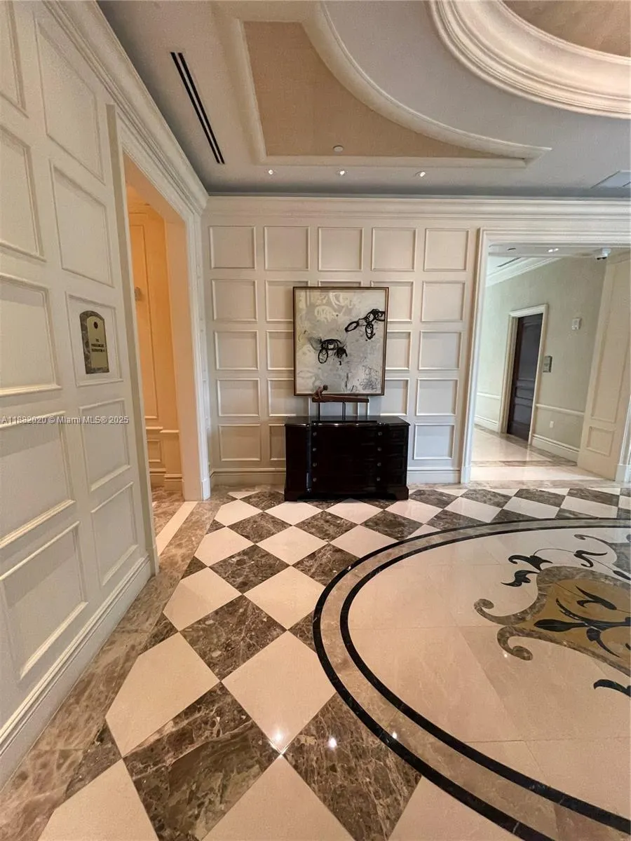 16047 Collins Ave, #404