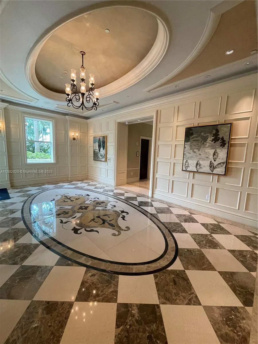 16047 Collins Ave, #404