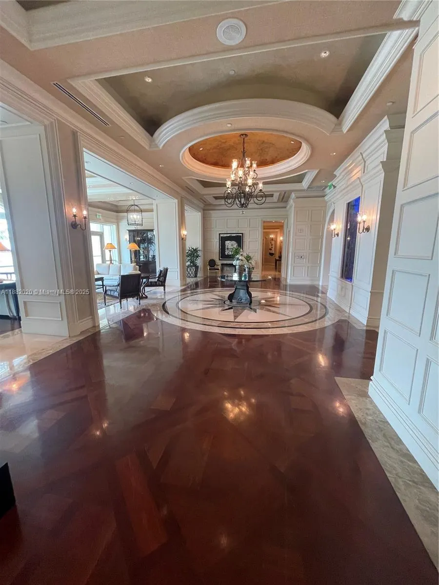 16047 Collins Ave, #404