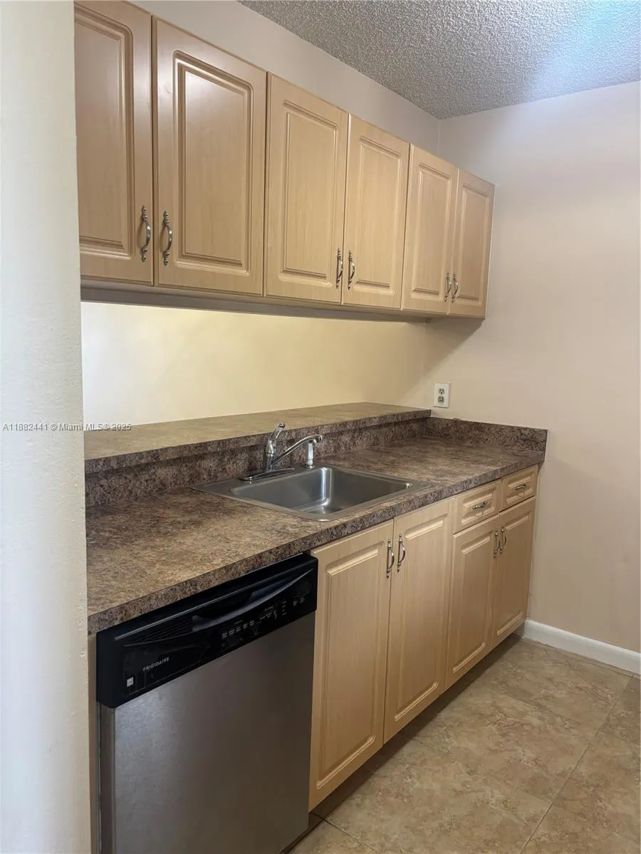 8600 N Sherman Cir, #203