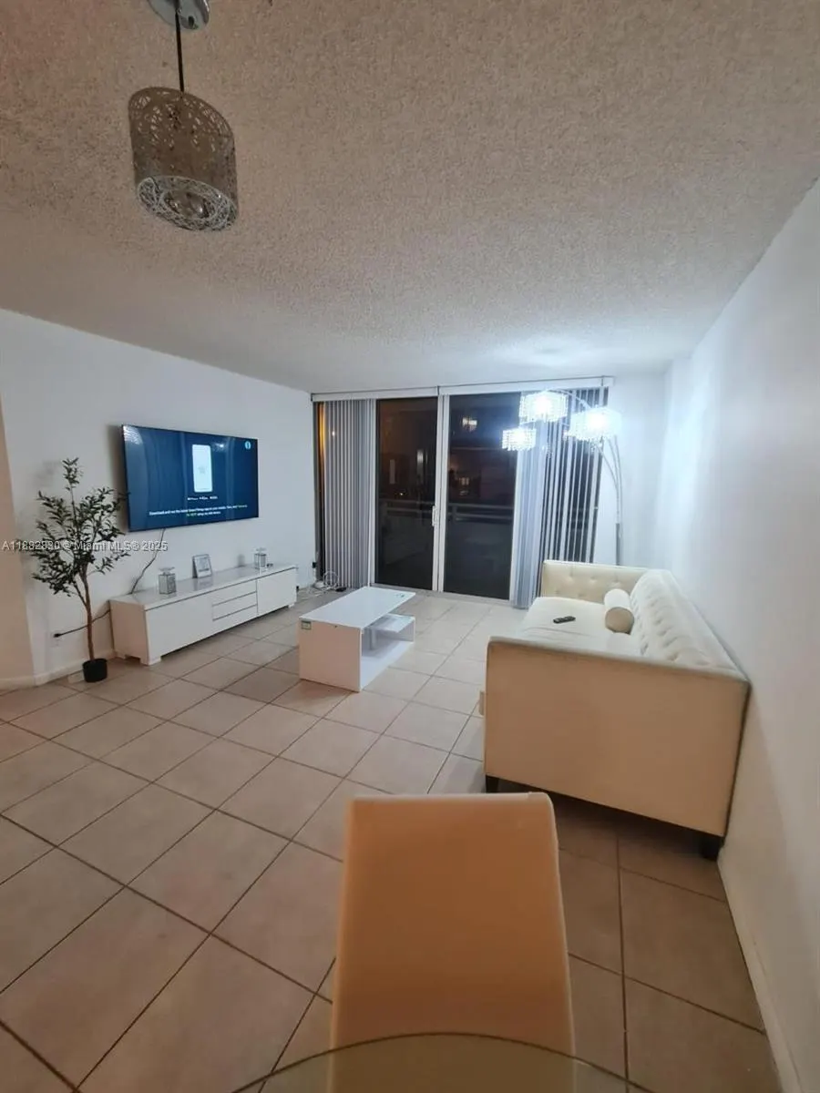8911 Collins Ave, #203