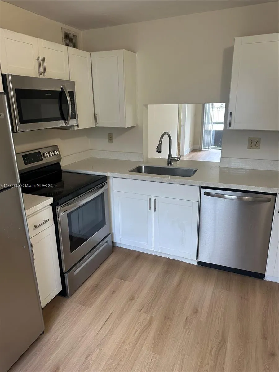 130 NW 60th Ave, #1-2