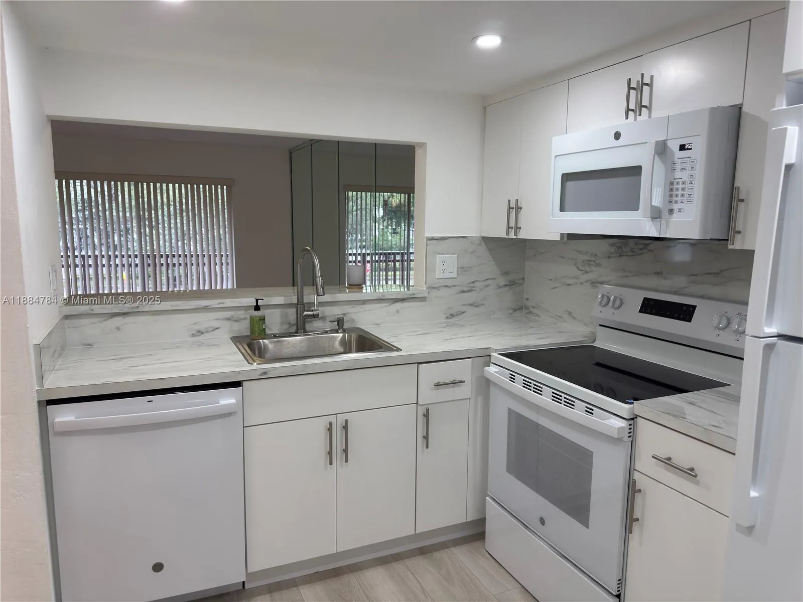 11291 SW 88th St, #202M
