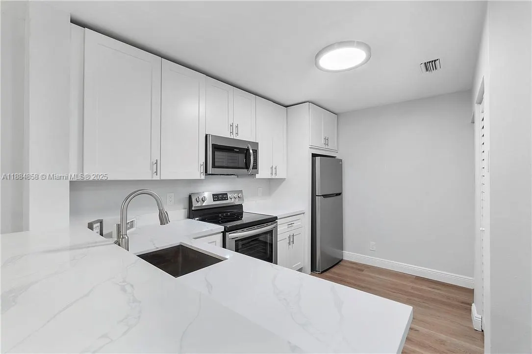 5861 Riverside Dr, #205A2