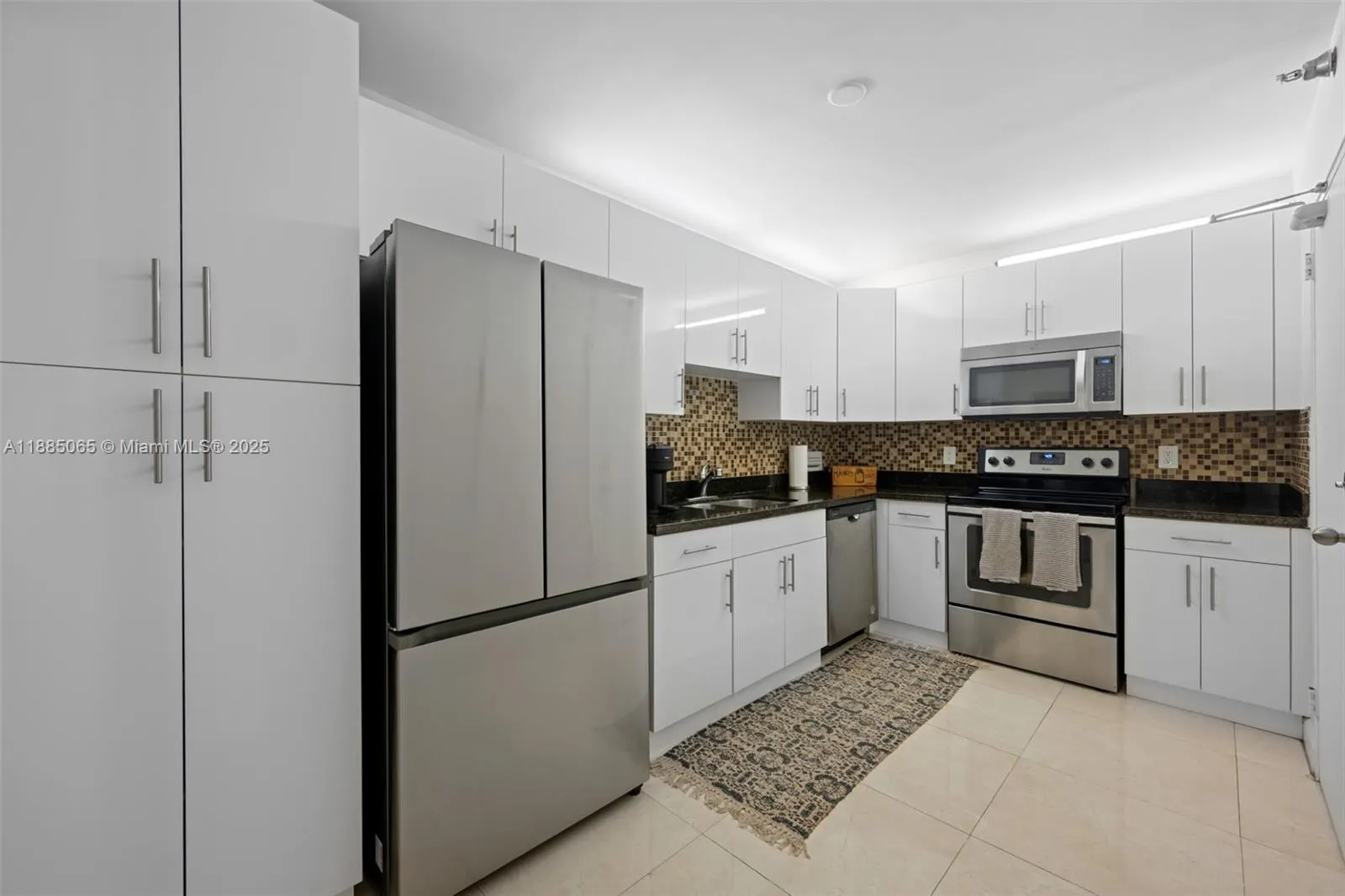 10185 Collins Ave, #306