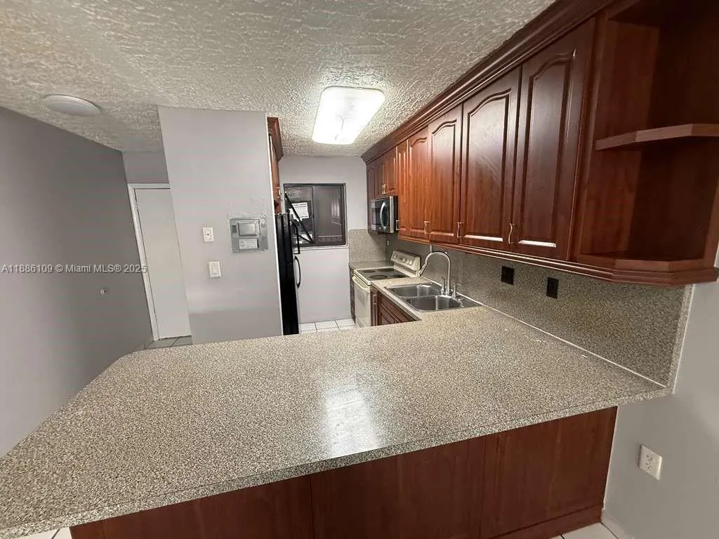 6055 W 19th Ave, #215