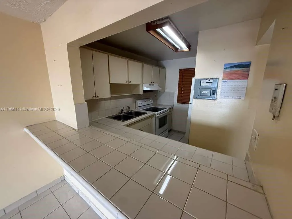 6055 W 19th Ave, #410