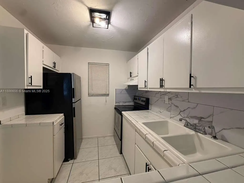 7610 Stirling Rd, #202G