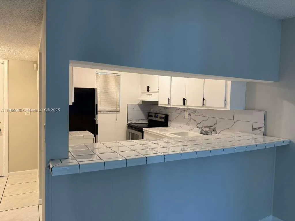 7610 Stirling Rd, #202G
