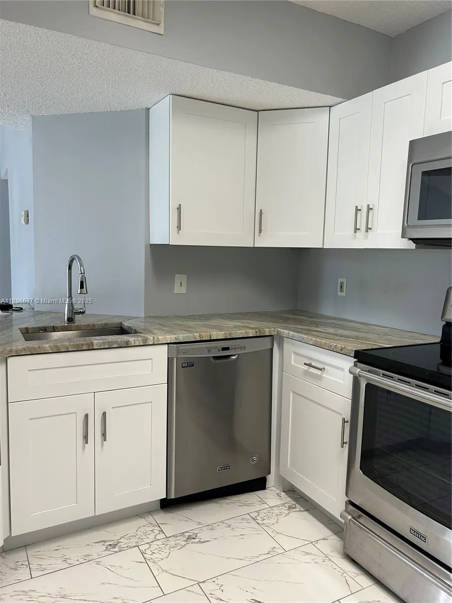8801 Wiles Rd, #306