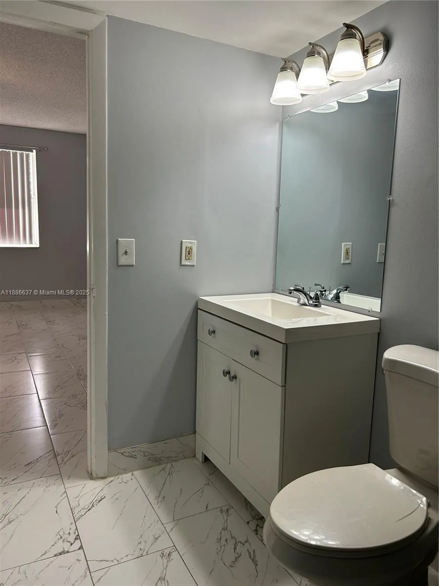 8801 Wiles Rd, #306