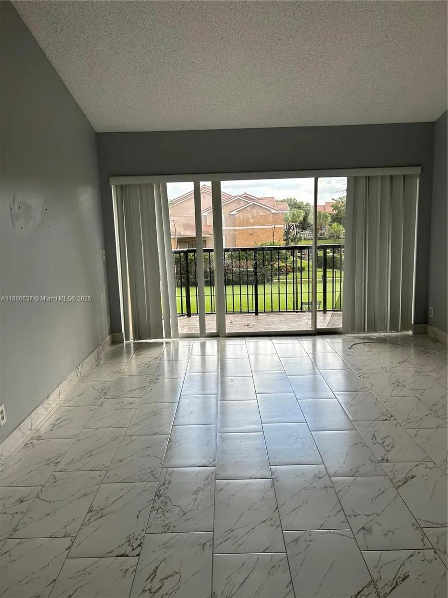 8801 Wiles Rd, #306