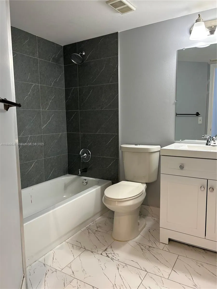 8801 Wiles Rd, #306