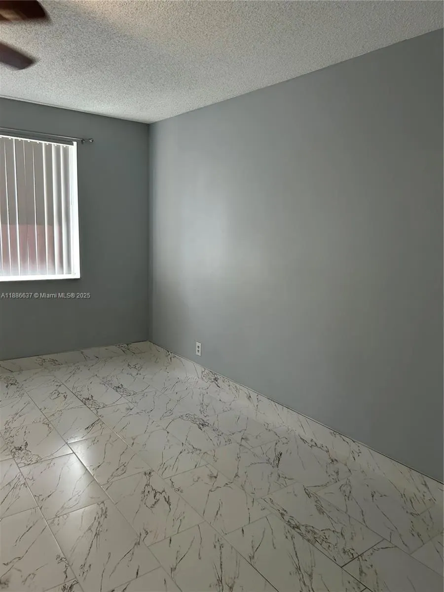 8801 Wiles Rd, #306
