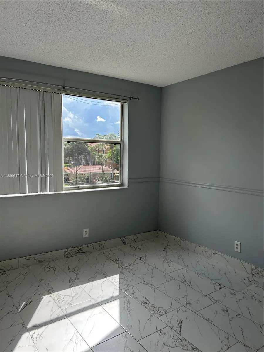 8801 Wiles Rd, #306