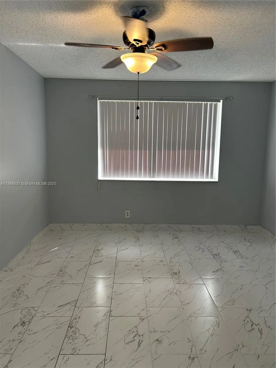 8801 Wiles Rd, #306
