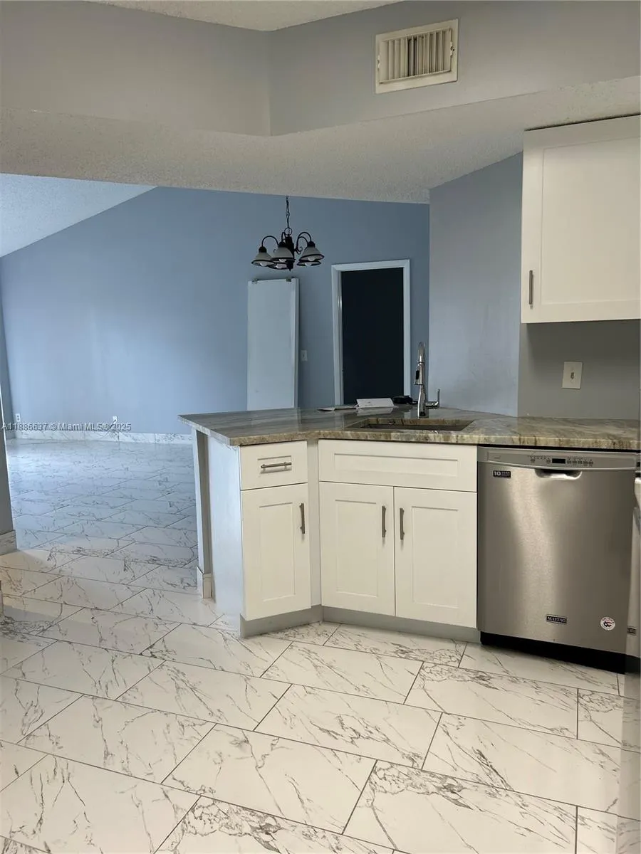 8801 Wiles Rd, #306